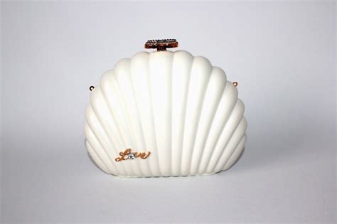 chanel clam pearl shell minaudiere bag clutch|chanel shell wedding bags reviews.